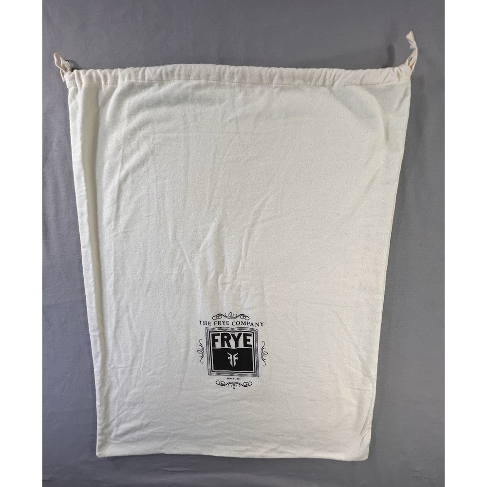The Frye‎ Company cream-colored cotton dust bag with a drawstring closure boots